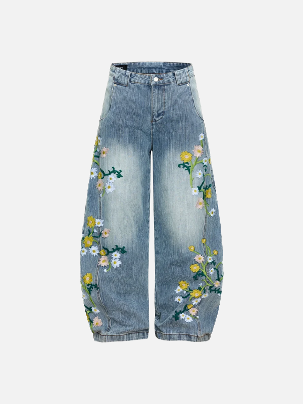 Vaqueros anchos con estampado de flores desgastadas y tiro alto