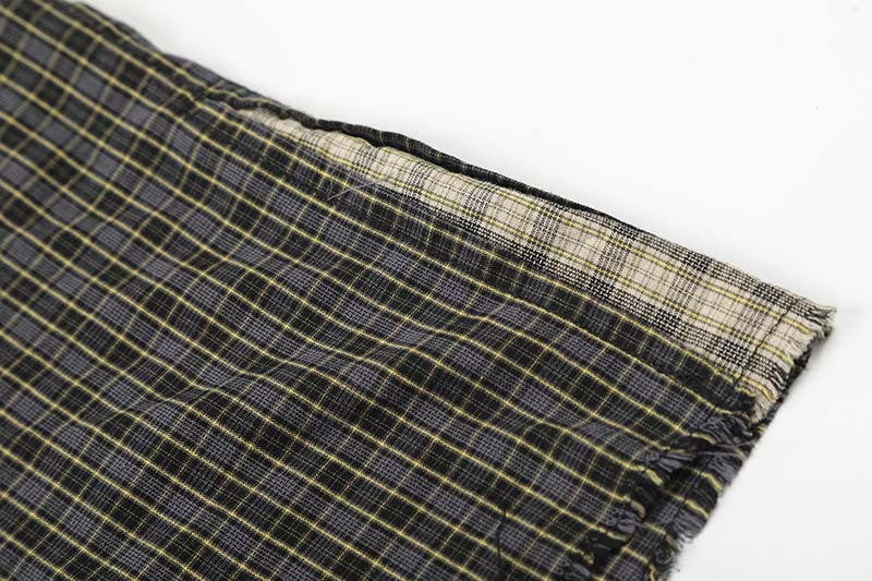 Camisa de manga corta a cuadros desgastada