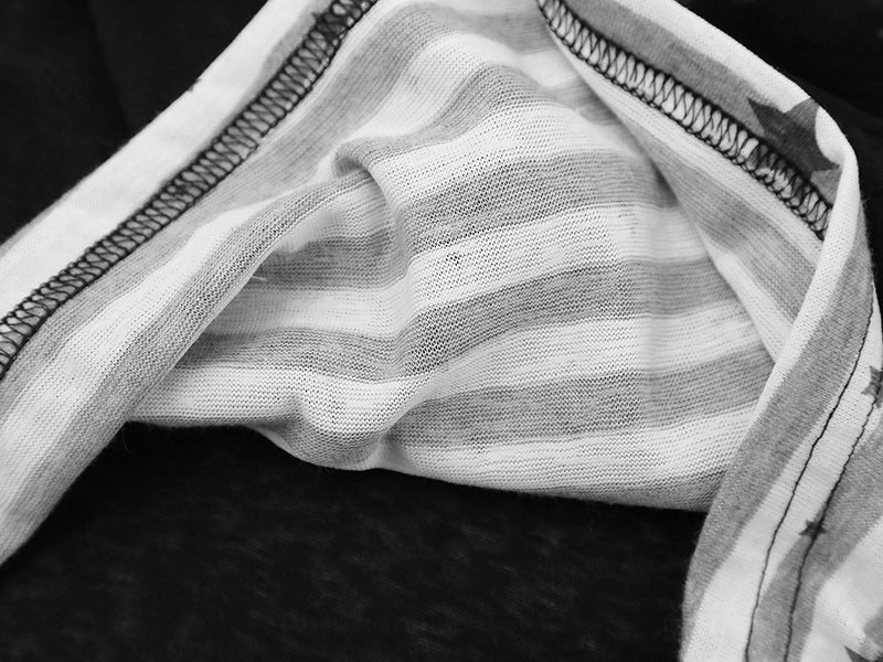Top de manga larga con cuello desbocado y capas