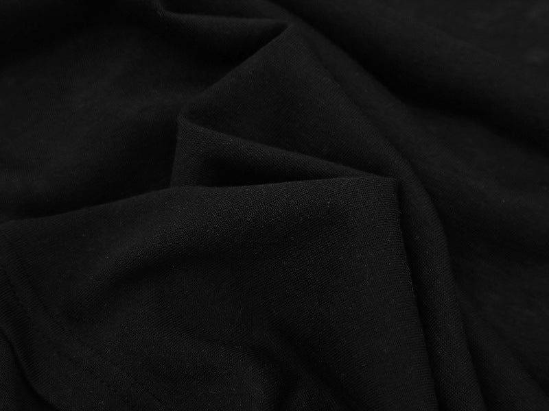 Top de manga larga con cuello desbocado y capas