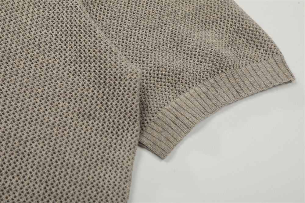 Polo beige claro y negro