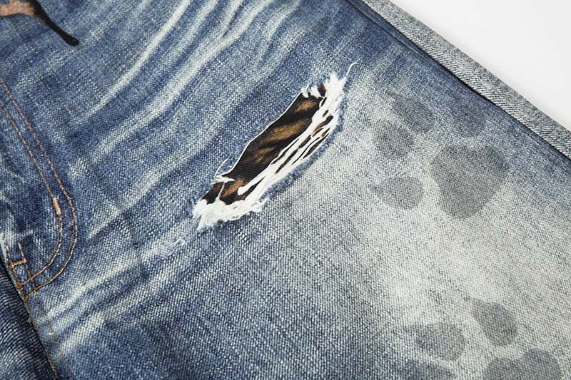 Tiger Stripe Distressed Wide-Leg Jeans