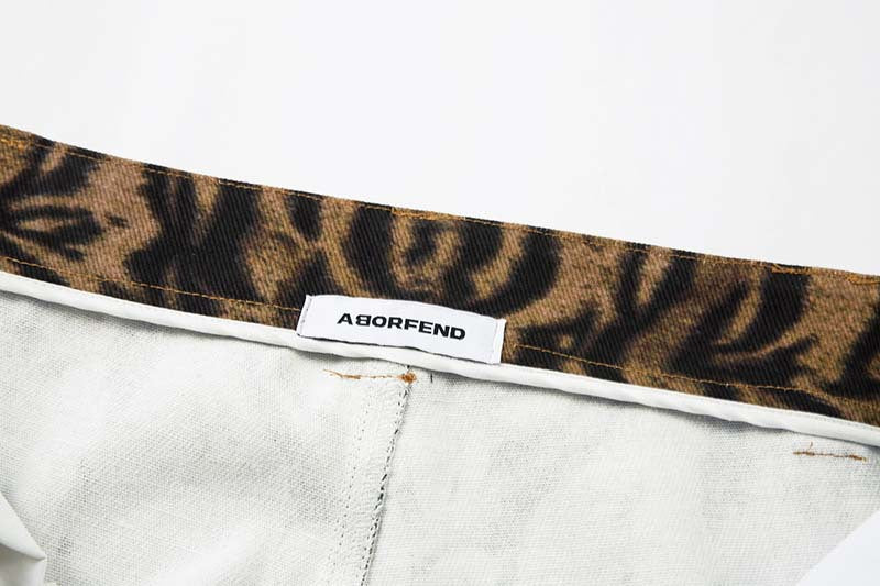 Tiger Stripe Distressed Wide-Leg Jeans