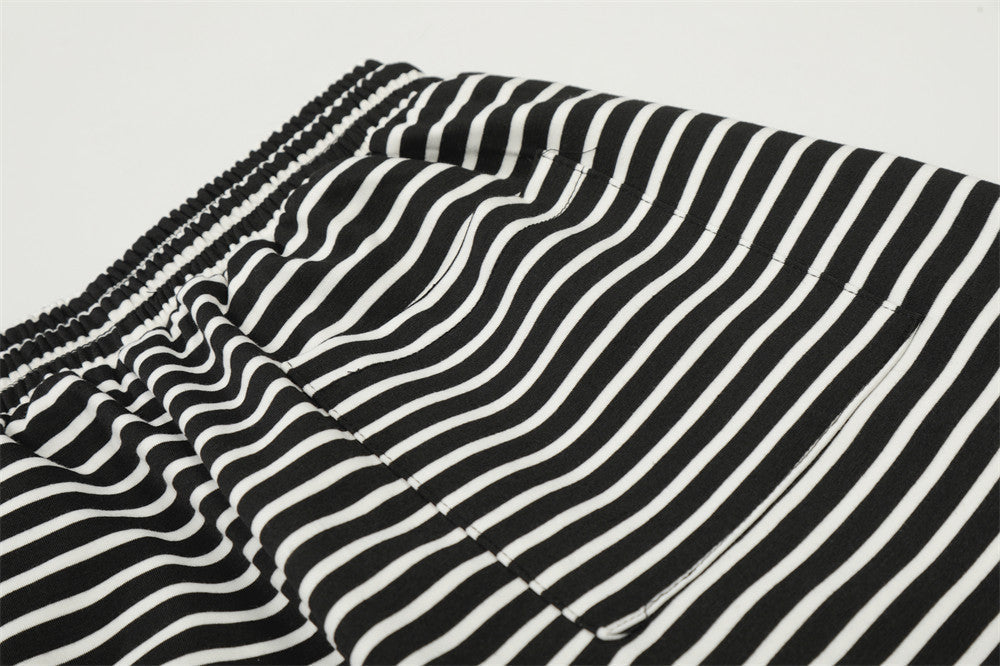 Pantalones de chándal de pierna ancha con rayas onduladas