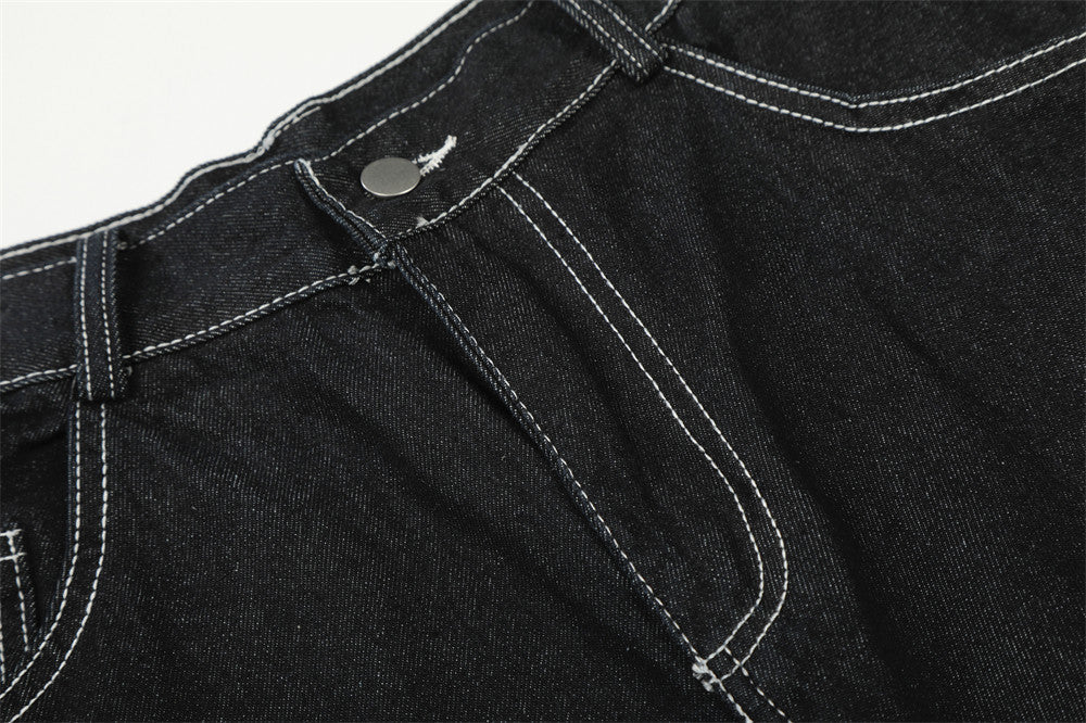 Pantalón corto vaquero de pernera ancha con estrellas bordadas