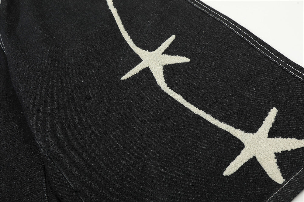 Pantalón corto vaquero de pernera ancha con estrellas bordadas