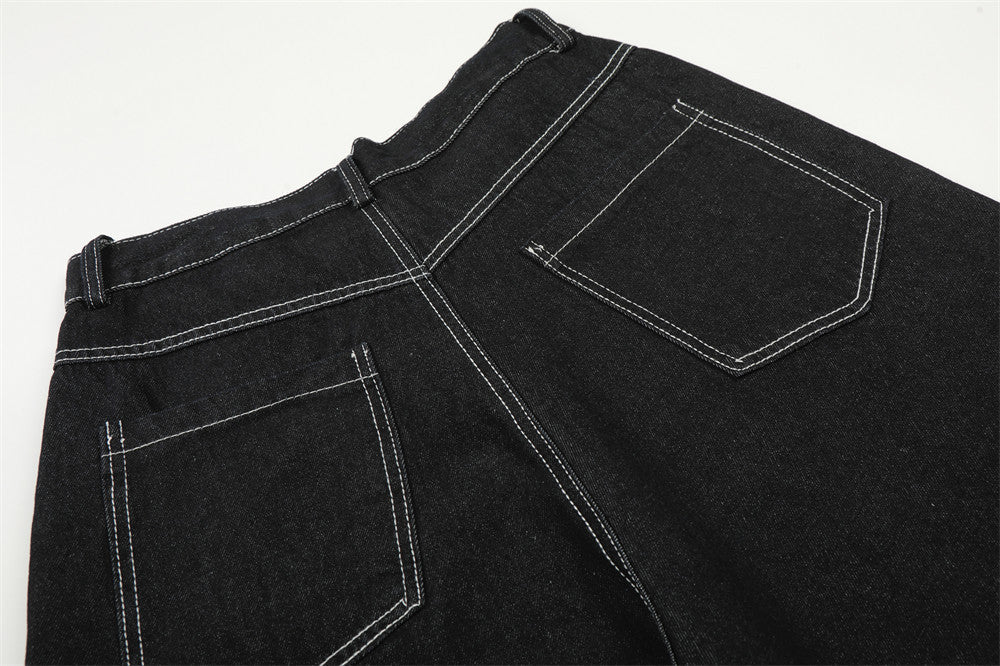 Pantalón corto vaquero de pernera ancha con estrellas bordadas