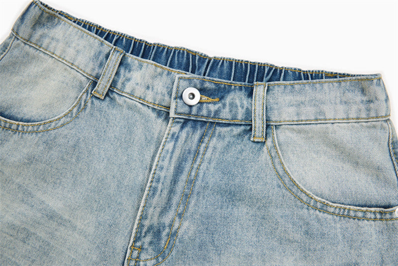 Pantalones cortos cargo de mezclilla desgastados de corte holgado