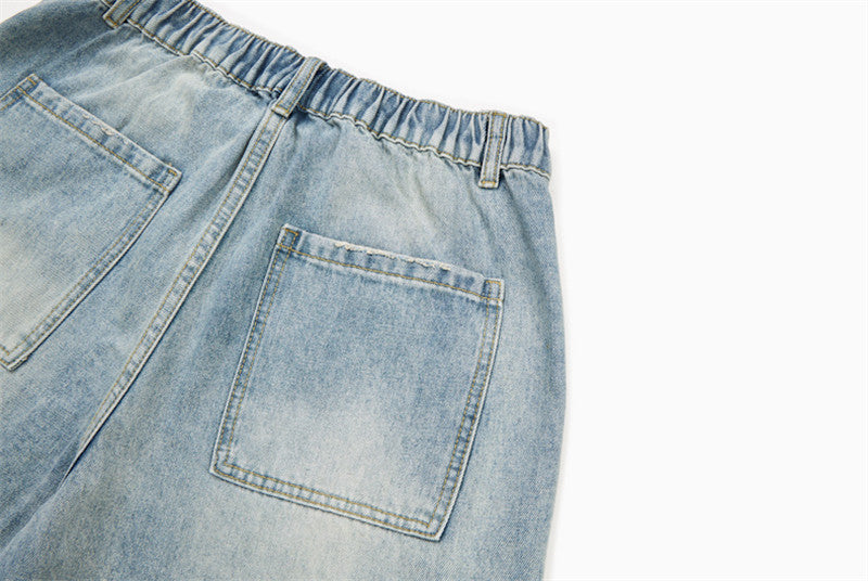 Pantalones cortos cargo de mezclilla desgastados de corte holgado
