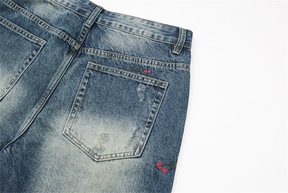 Distressed Floral Embroidered Wide-Leg Jeans