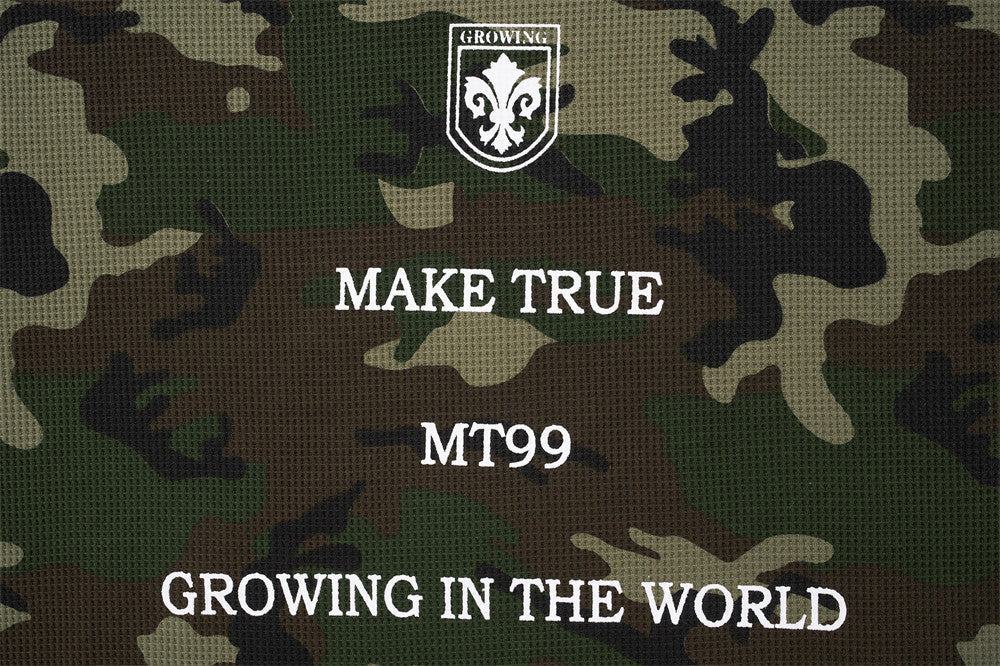 Blusa de manga larga de punto de gofre con estampado de camuflaje