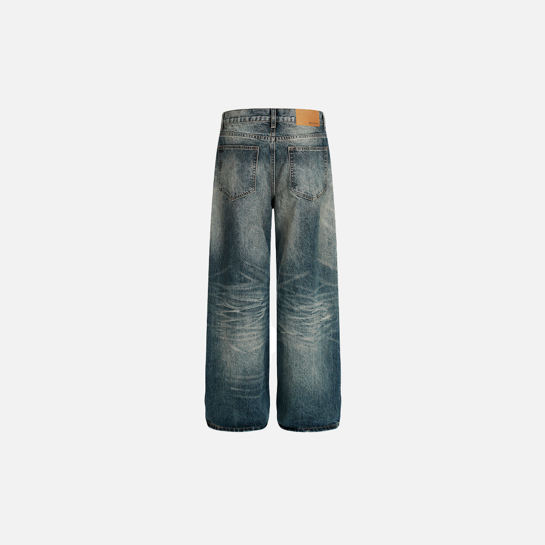 Vaqueros de pierna ancha de denim desgastado y lavado vintage