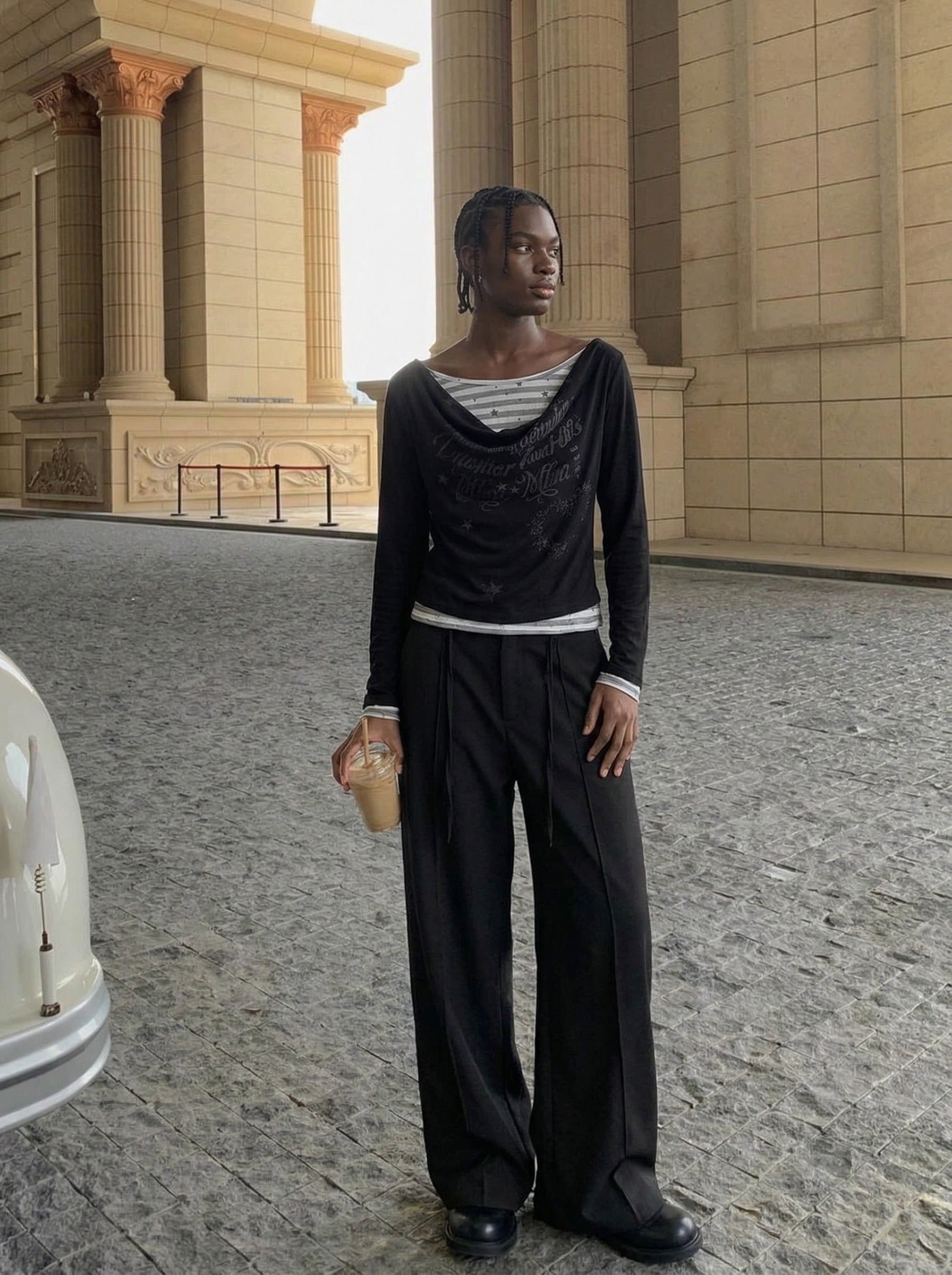 Top de manga larga con cuello desbocado y capas