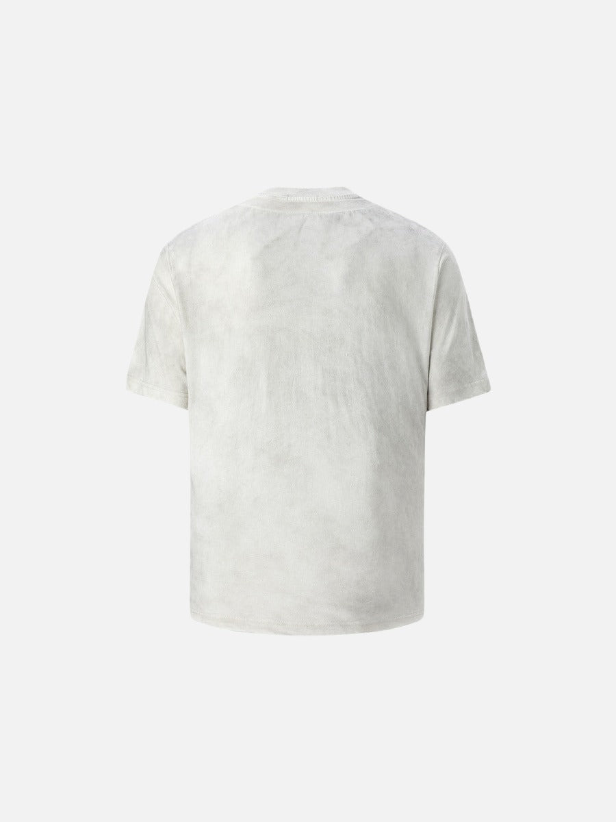Camiseta estampada con texto descolorido