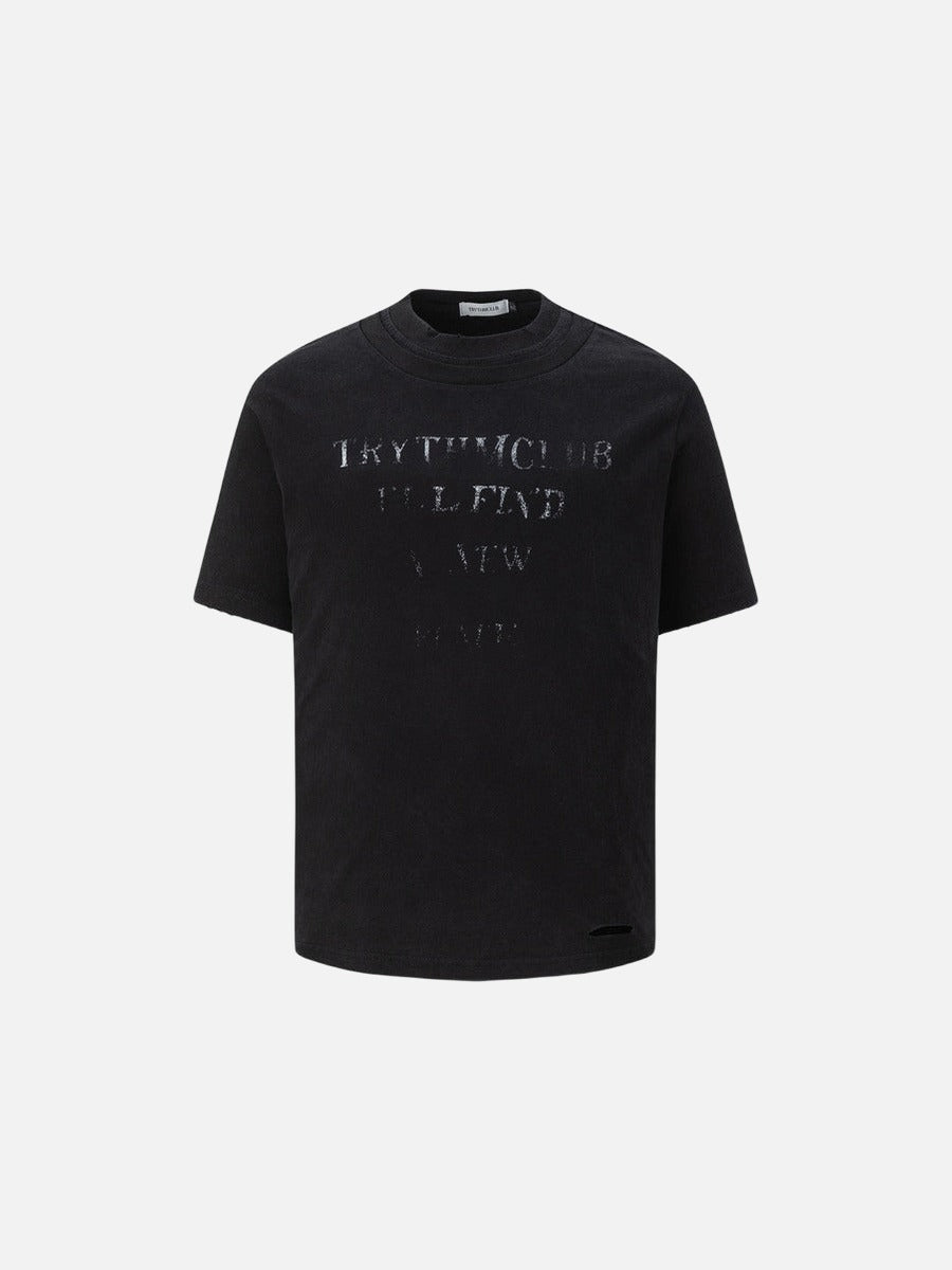 Camiseta estampada con texto descolorido