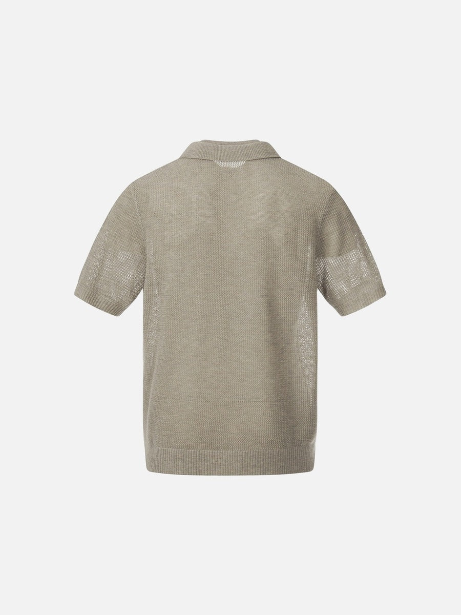 Polo beige claro y negro