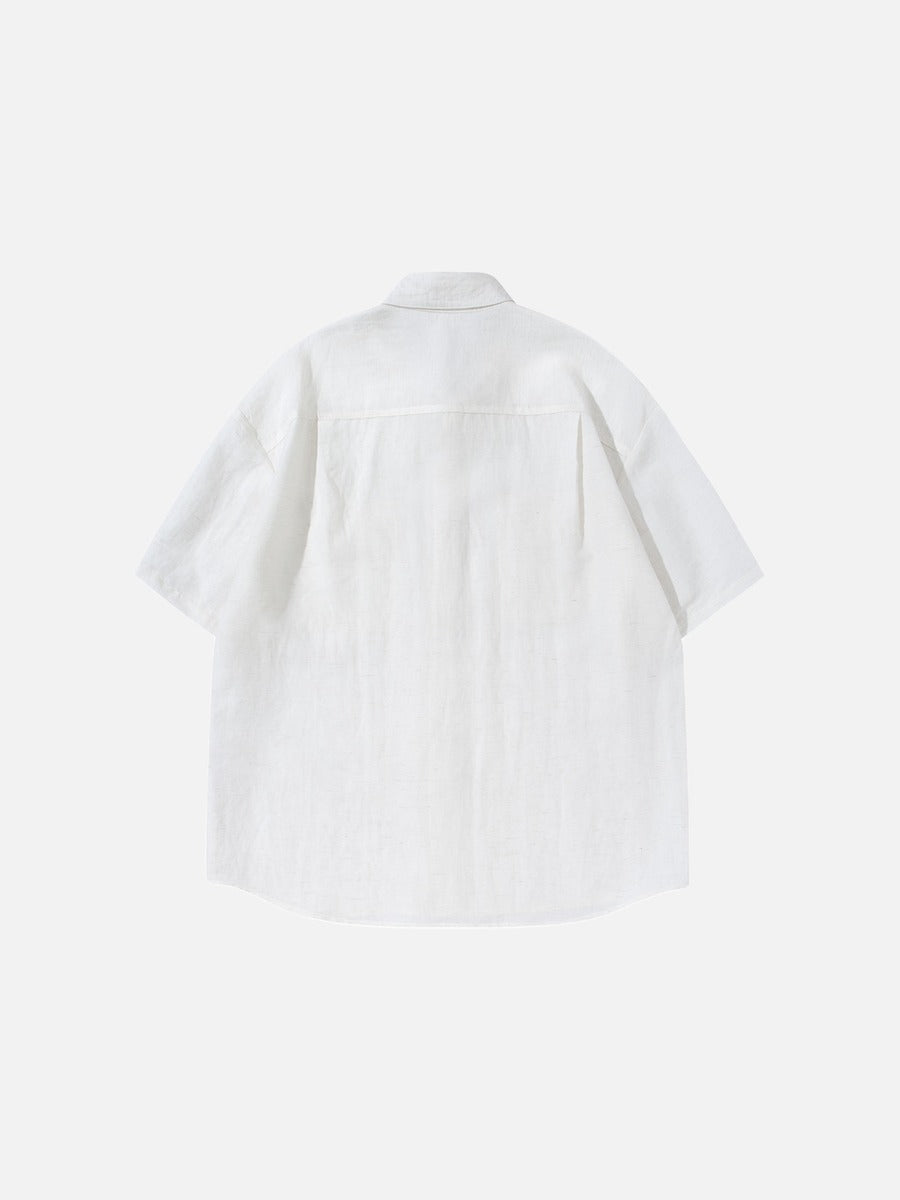 Camisa abotonada de manga corta y corte holgado
