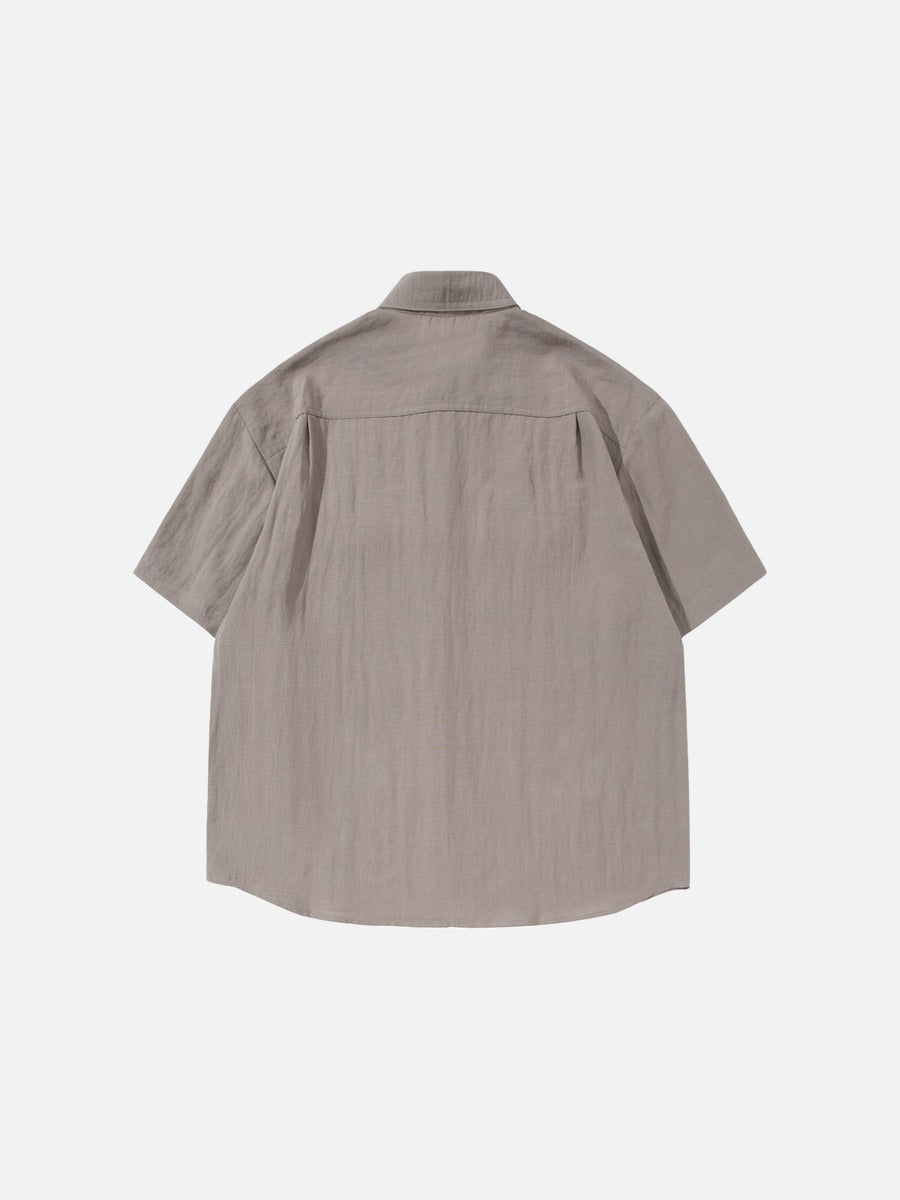 Camisa abotonada de manga corta y corte holgado