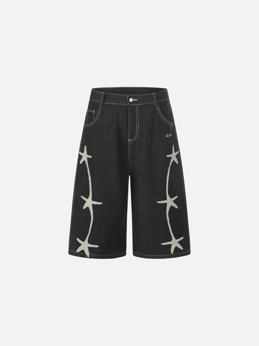 Pantalón corto vaquero de pernera ancha con estrellas bordadas