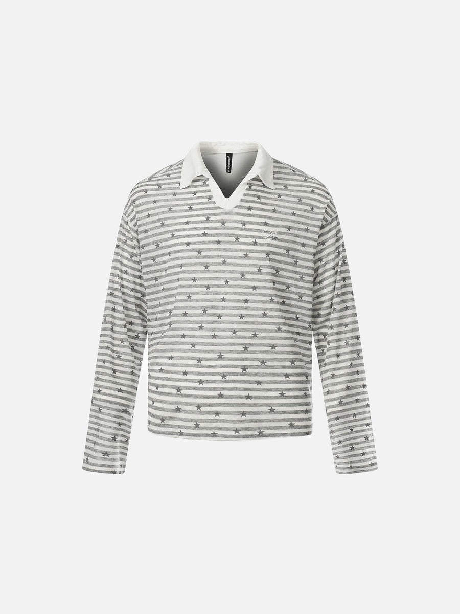 Polo de manga larga a rayas con estampado de estrellas