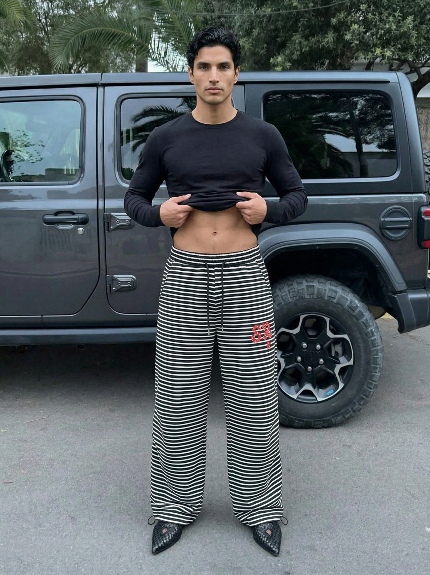 Pantalones de chándal de pierna ancha con rayas onduladas