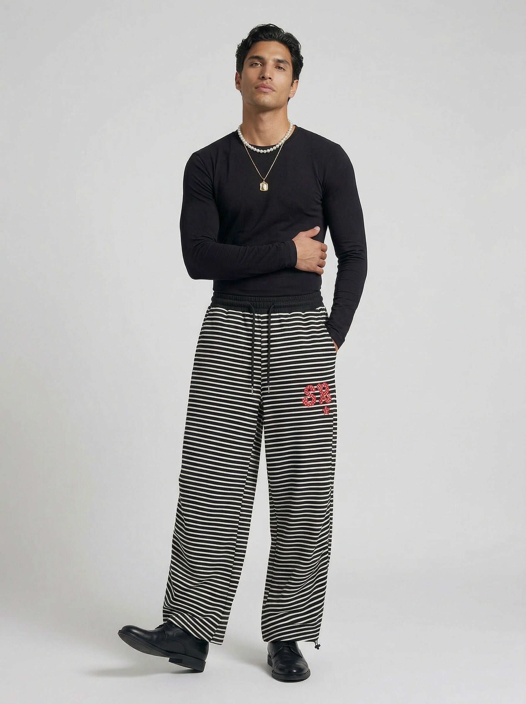 Pantalones de chándal de pierna ancha con rayas onduladas